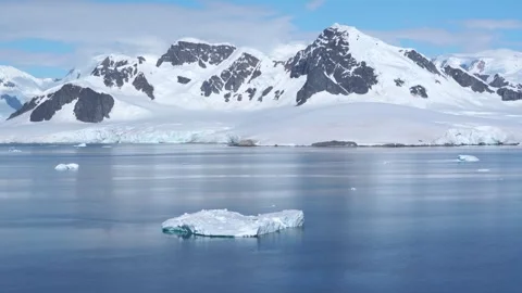 Antarctica Iceberg Floating on Calm Waters in Bismarck Strait, Snow-Capped .. Stock Footage 342659818