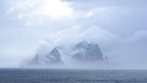 Antarctica Landscape Stunning Mountain Covered in Clouds with Dramatic Ligh.. Stock Footage 340590691