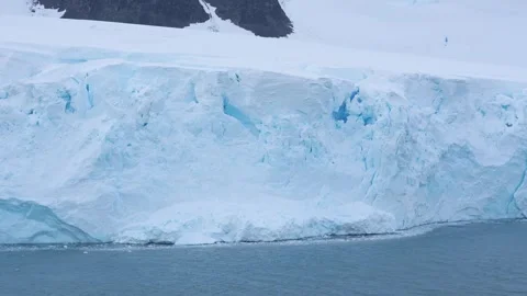 Antarctica Massive Wall of Ice Glacier on Mountain Incredible Sailing Past .. Stock Footage 344463227