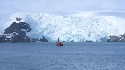 Antarctica Red Science Research Vessel Ship Very Wide Shot in Ocean Glacier.. Stock Footage 340591646