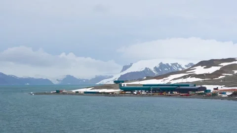 Antarctica Research Station Base with Wind Turbines Wide Vista Stock Footage 277919486