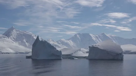 Antarctica two square icebergs time lapse 動画素材 83494863