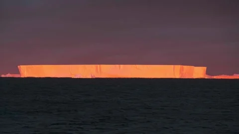 Antarctica winter mountain sunset landscape. Aerial view sunrise over frozen Stock Footage 324087633