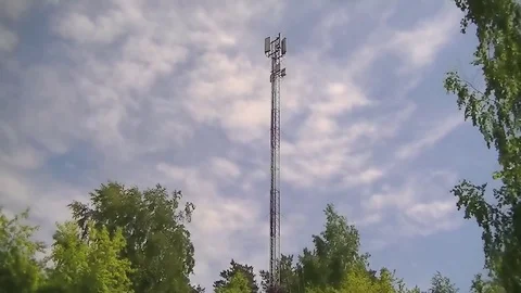 Antenna of the cellular communication on the background the sky Stock Footage 76520440