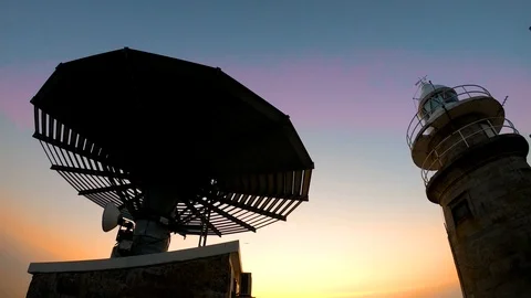 ANTENNA OF COMMUNICATION AND LIGHTHOUSE Stock Footage 94230236