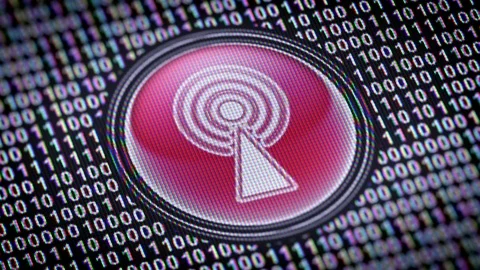 Antenna icon. Binary code ( array of bits ) in the screen. Looping footage 動画素材 110740405