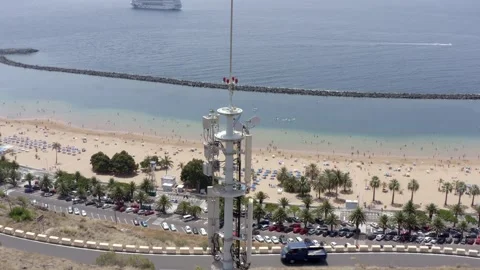 Antenna next to a beach. Communication tower. Tenerife. Drone. Aerial. Stock Footage 208940145