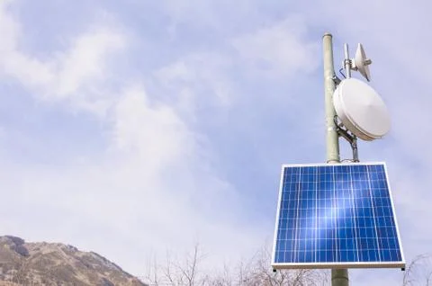 Antenna repeater with solar panel Stock Photos