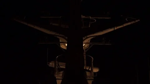 Antenna spinning on the ferry deck at night. radar of cruise ship Stock Footage 125500143