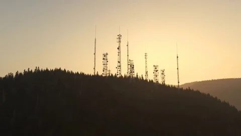 Antennas complex on a forest hill Stock Footage 77337560