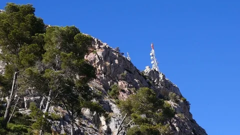 Antennas on top of cliff Stock Footage 79954935