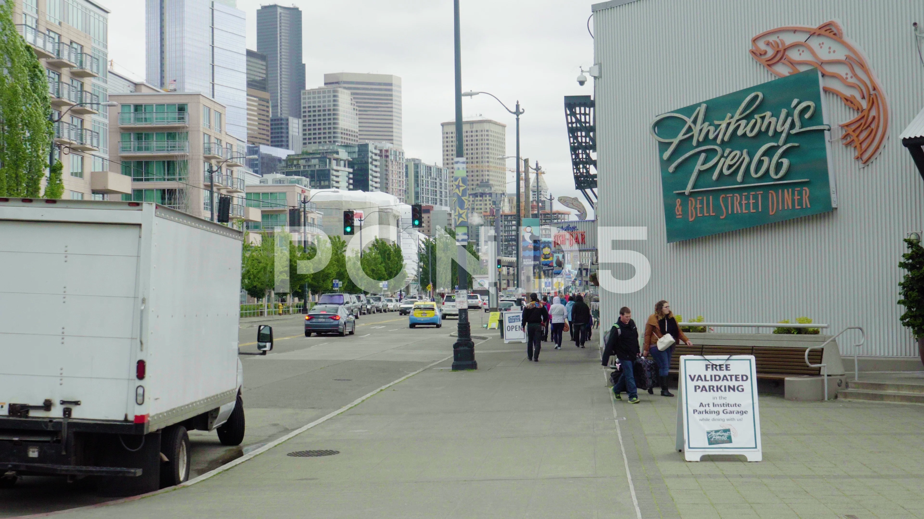 Anthony S Pier 66 Sign With Cars Driving By In Seattle Hi Res