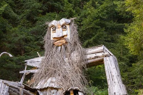 Anthropomorphic wood installation on the path to Buffaure and Col Valvacin in Stock Photos