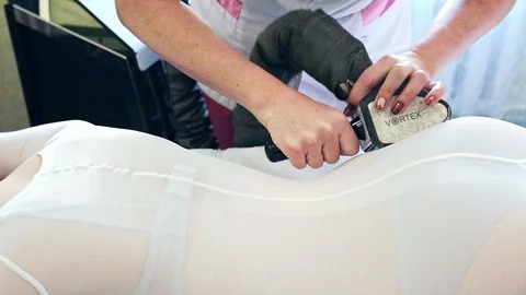 Anti-cellulite LPG massage to correct the female figure. Stock Footage 121135792