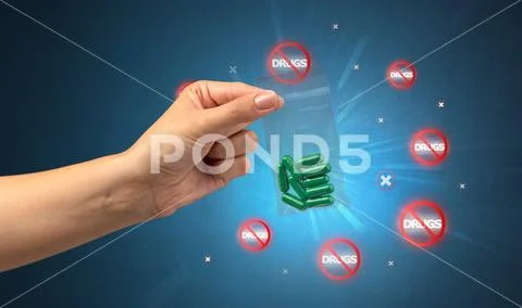 Anti-drug concept and hand giving pills Stock Photos