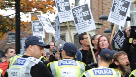 Anti fascist protestors chant Stock Footage 114073684