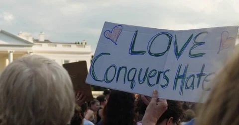 Anti-Hate Protesters Hold Signs Outside The White House  	 Stock Footage 78884512