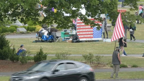 Anti law enforcement protests upside down American Flag Close Up Stock Footage 311658989