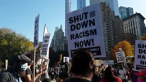Anti-Racist Workers Assembly group rallies near Columbus Circle in New York City Stock Footage 143036363