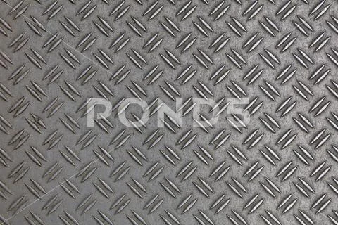 Anti slip gray metal plate with diamond pattern Stock Photos