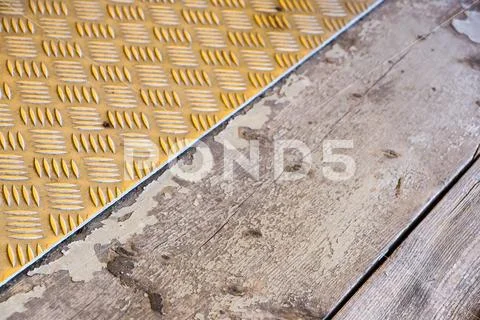 Anti-slip pads detail yellow and wood close up Stock Photos
