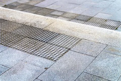 Anti-slip step in square shape on granite steps Stock-Fotos