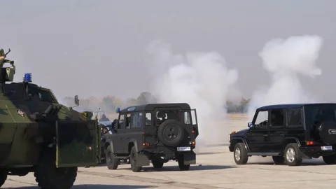 Anti Terrorism Special Forces stop Terrorists with Black Military Vehicles Stock Footage 82687929