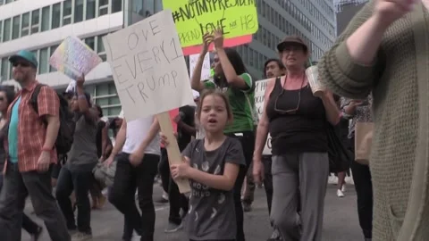 Anti-Trump Demonstrators Marching While Shouting "Black Lives Matter" Video stock 223968877