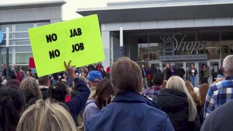 Anti-Vaccination Protester Holding Up A Sign During A Speech Stock Footage