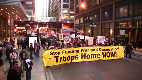 Anti-War Protest Marches Through City Streets in United States Stock Footage 149276180