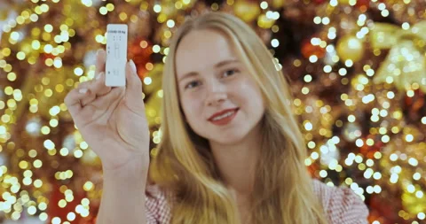 Antigen test negative result. Young woman show self-test smiling to camera Stock Footage 166988685