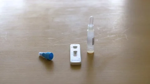 Antigen test on a table at home Stock Footage 151786223