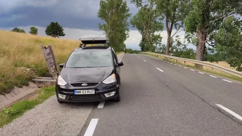 Antigravitional hill: a car rolls up the hill without engine and reach 15 km/h, Video stock 246878787
