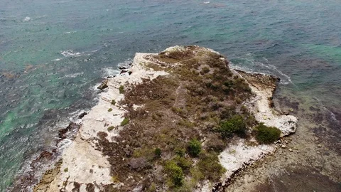 Antigua and barbuda cliff in devil's bridge area waves and wind aerial drone 4k Stock Footage 111308826