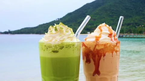 Antioxidant drinks with eco straws close up. Cinematic video of invigorates Stock Footage 246556655