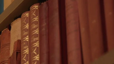 Antique books in library Stock Footage 102368182