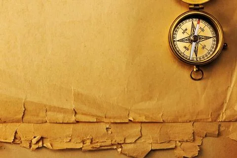 Antique brass compass over old background Antique brass compass over old p... 스톡 사진