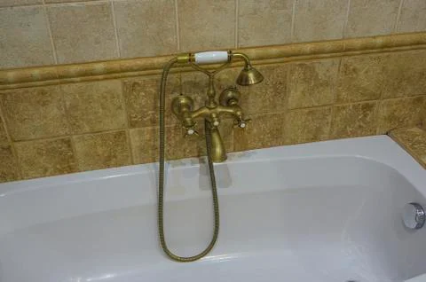 Antique brass shower Stock Photos