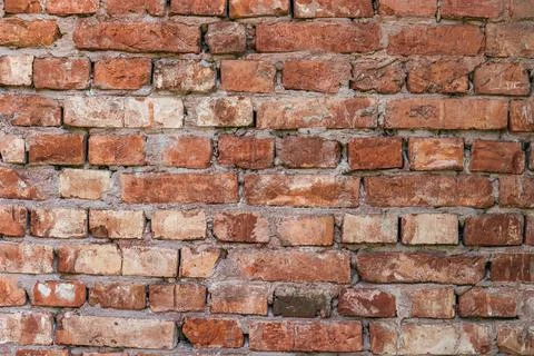 Antique brick wall background, ancient red brick masonry surface. Textured ba Stock Photos