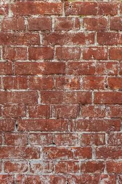 Antique brick wall background, ancient red brick masonry surface. Textured ba Stock Photos