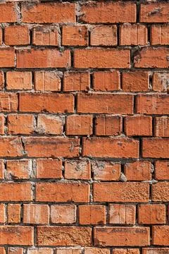 Antique brick wall background, ancient red brick masonry surface. Vintage t.. Stock Photos