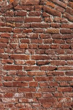 Antique brick wall background, ancient red brick masonry surface. Textured ba Stock Photos
