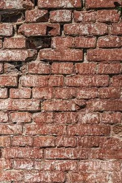 Antique brick wall background, ancient red brick masonry surface. Textured ba Stock Photos