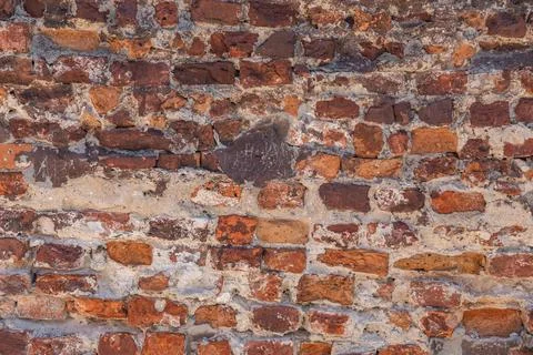 Antique brick wall background, ancient red brick masonry surface. Vintage t.. Stock Photos