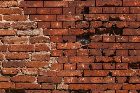 Antique brick wall background, ancient red brick masonry surface. Vintage t.. Stock Photos