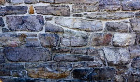 Antique brick wall surface Stock Photos