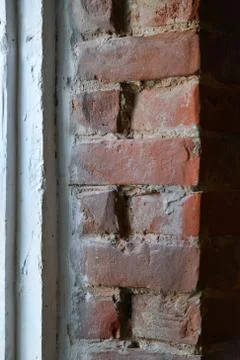 Antique brickwork in the window opening Stock Photos