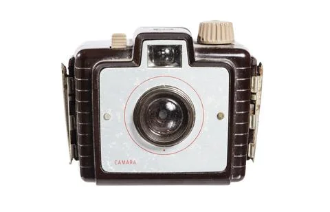 Antique camera on a light background Stock Photos