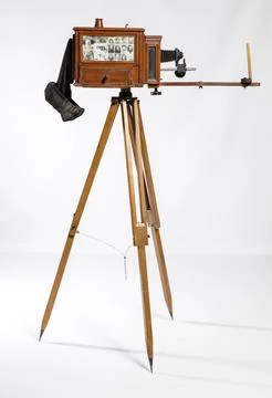 Antique camera on a light background Stock Photos