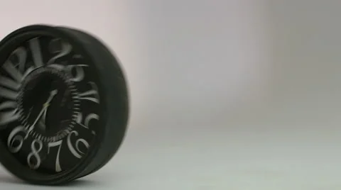 Antique clock rolling on the floor. Stock Footage 59719647